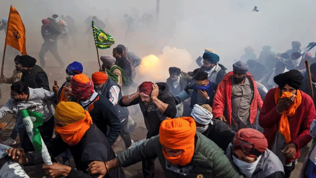 India farmers resume march towards Delhi; cops fire tear gas shells
