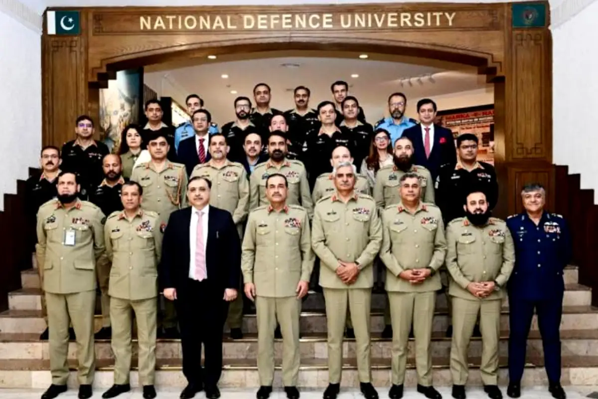 Field Marshal visits NDU, talks on changing security challenges
