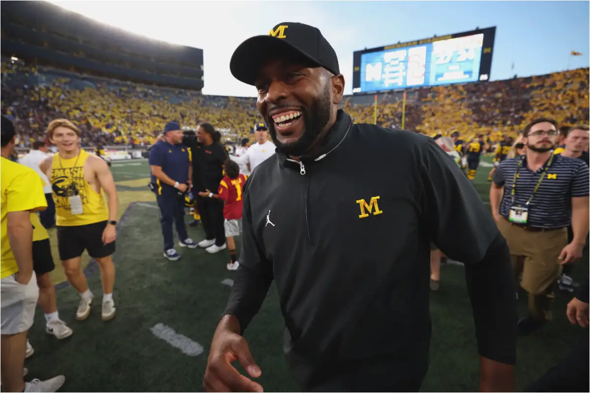 Why was Sherrone Moore arrested