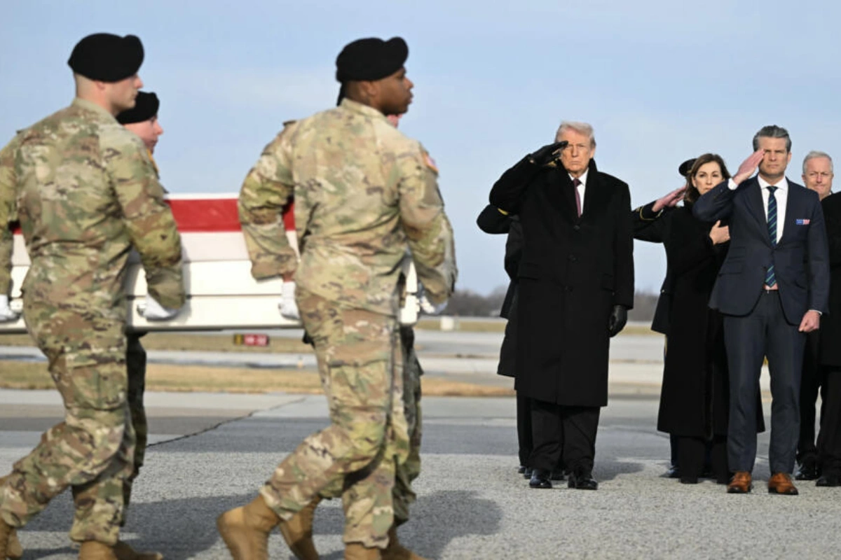 Donald Trump attends ceremony for fallen US soldiers