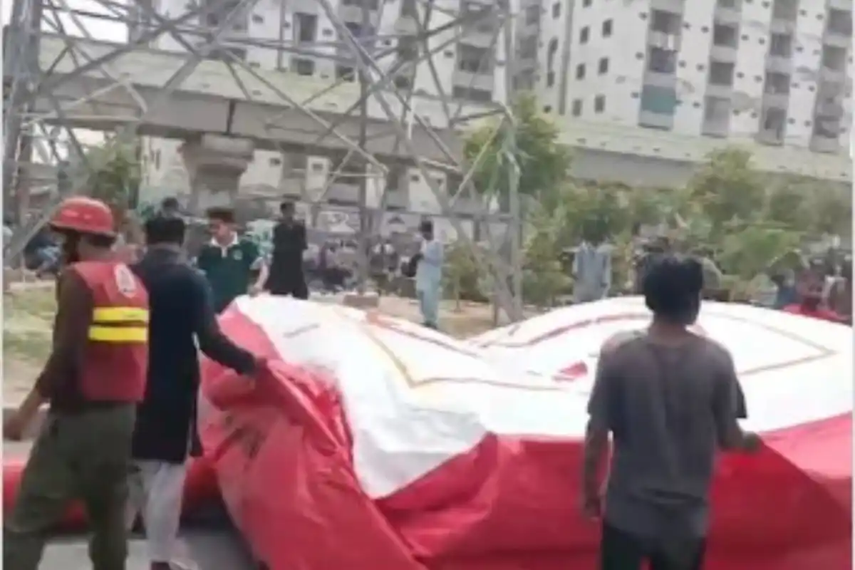 Man Climbs High-Tension Electric Pole Near Surjani Chowrangi in Karachi, Rescue Operation Underway