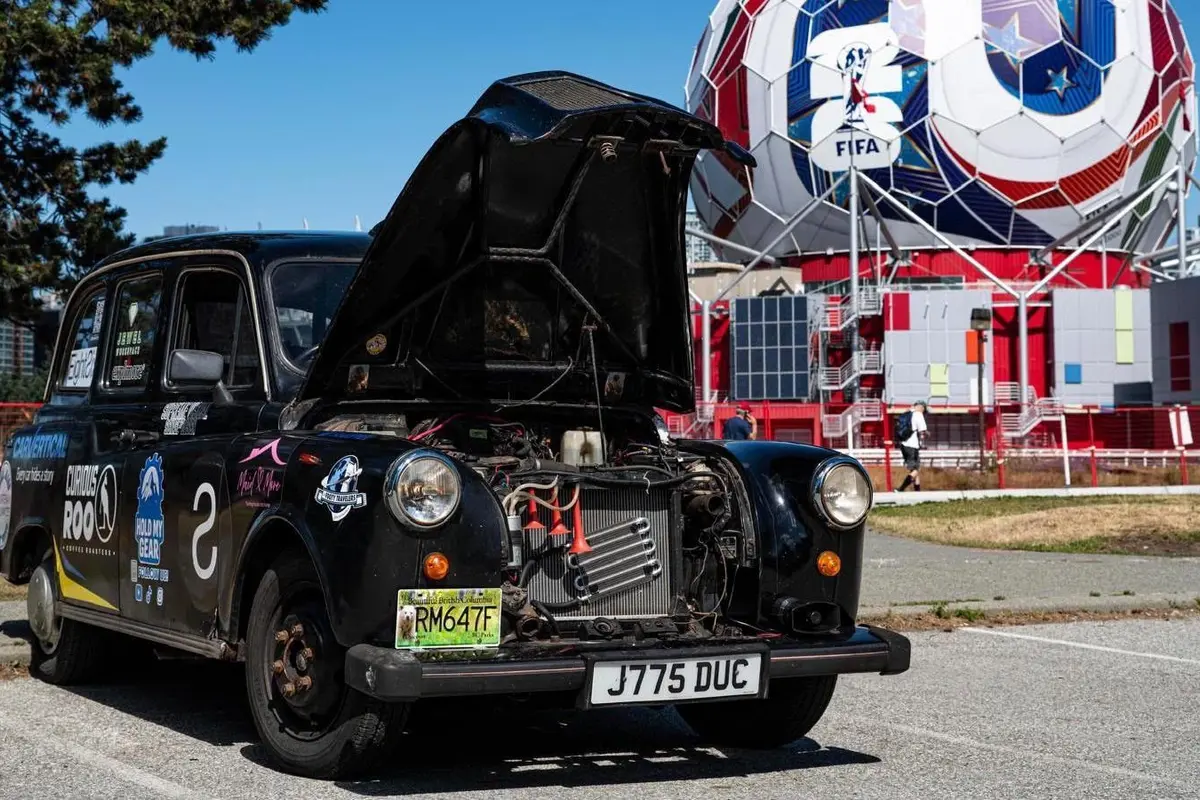 Two Friends Take 10,000-Mile Black Cab Journey Across World Cup Venues