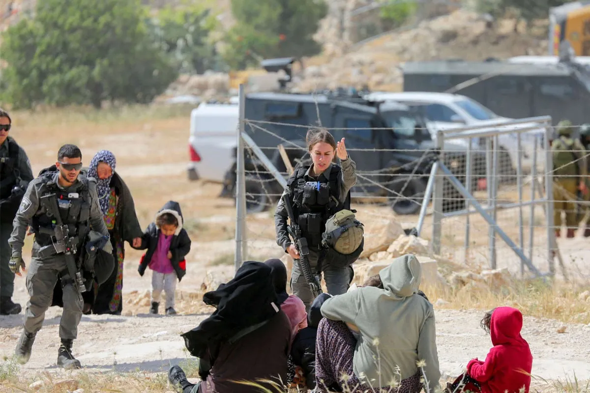 Video Shows Israeli Soldiers, Settler Assaulting Disabled Palestinian in West Bank
