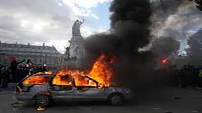 Curfew imposed in parts of central Paris and other cities after rioting across France