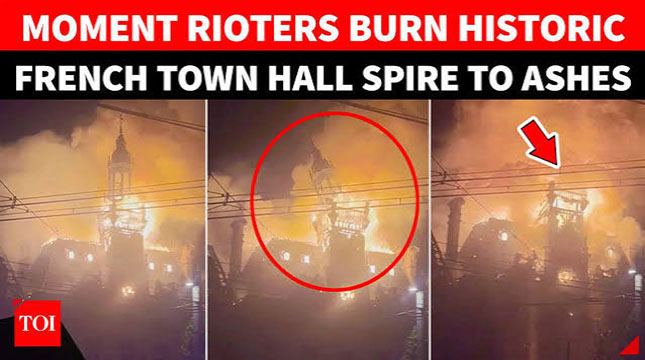 Moment historic French town hall spire collapses in flames amid protests